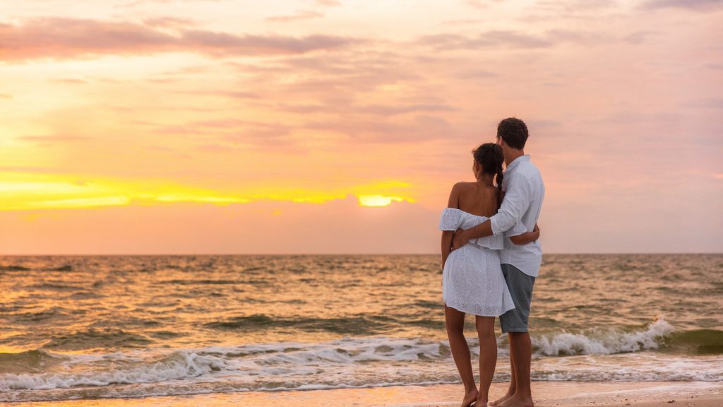 CFLOW A couple on beach in sunset romantic